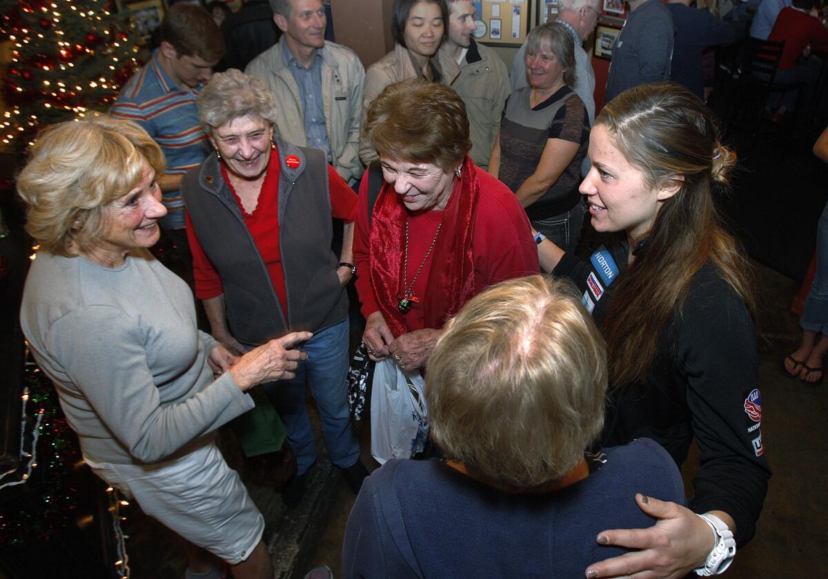 Kate Hansen, right, competing in the luge in the wither Olympics in Sochi, greets and thanks supporters, including Cynthia Smithers, of La Canada Flintrdge, Toni Brooks, of Pasadena, Ann Neilson, of La Canada Flintrdige and Claudia Beach, (back to camera) at Los Gringos Locos in La Canada Flintridge on Monday, December 23, 2013.