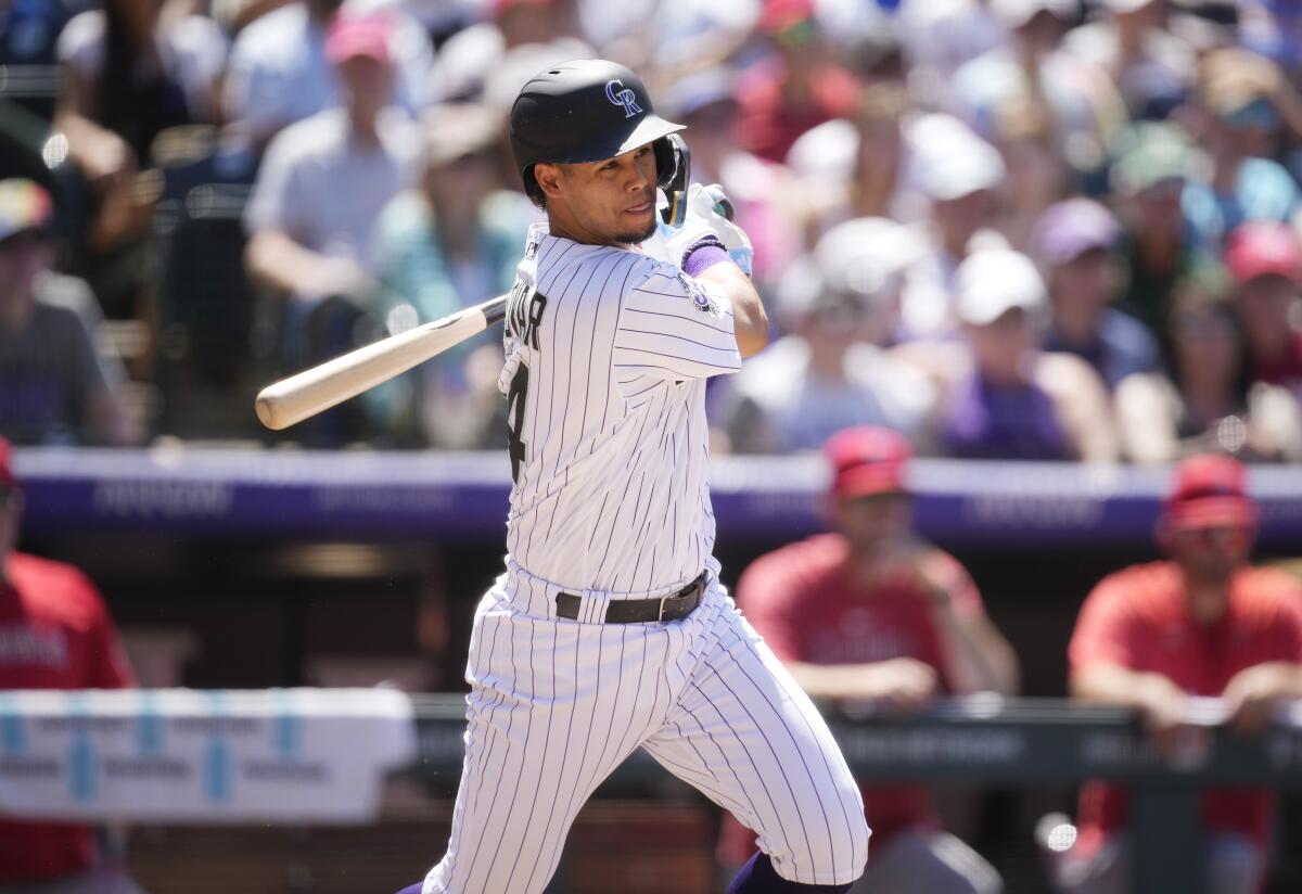 Rockies beat Red Sox, 4-3, in their first extra-inning game of season