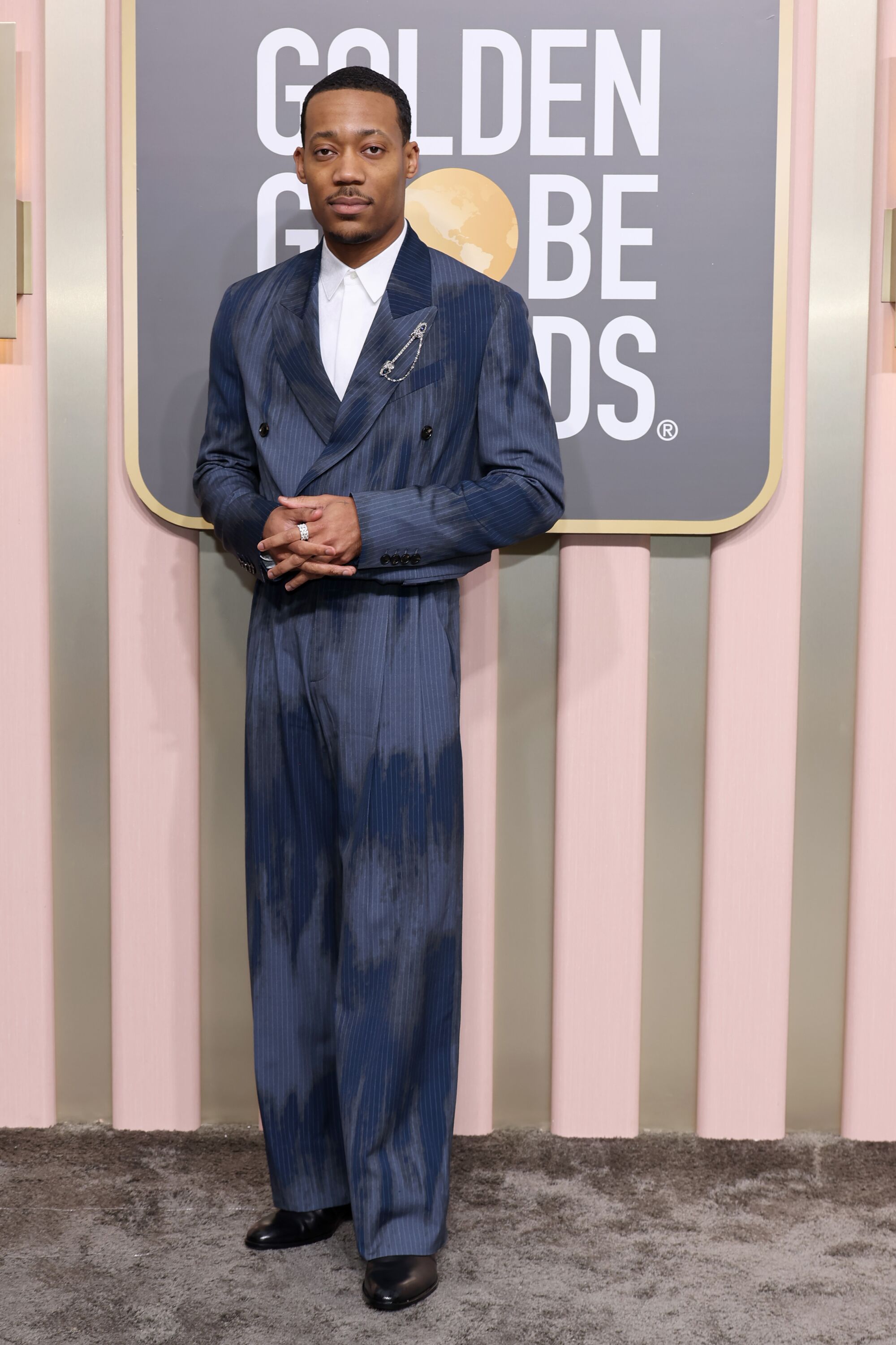 Everybody loves Tyler James Williams' Amiri suit at the Golden Globes.