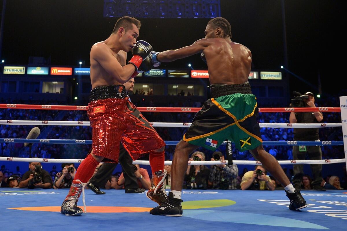 Nonito Donaire, left, fights Nicholas Walters at StubHub Center in 2014. The Filipino Donaire will face Jessie Magdaleno Nov. 5 in Las Vegas.