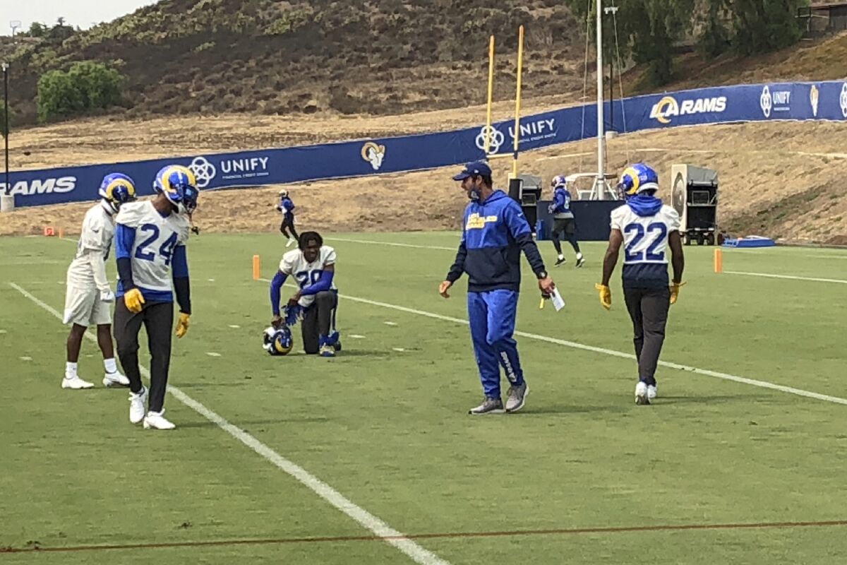 Brandon Staley, second from right, instructs Rams players during a practice session in September.
