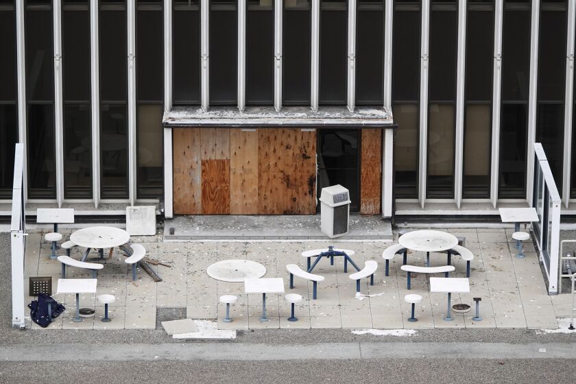 SAN DIEGO, CA - JUNE 29: Debris covers a patio area at the former Sempra Energy building at 101 Ash Street in downtown San Diego on Tuesday, June 29, 2021.. (K.C. Alfred / The San Diego Union-Tribune)