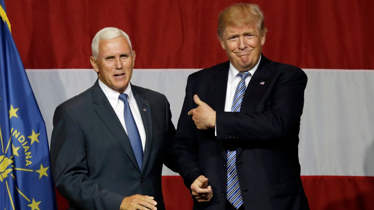 President Trump and Vice President Mike Pence at a campaign rally in 2016. Now Trump has tapped Pence to head U.S. efforts to combat the novel coronavirus COVID-19.