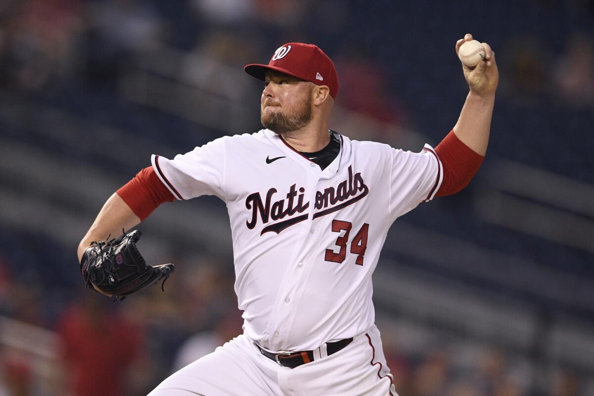 Washington Nationals starting pitcher Jon Lester delivers during the fifth inning of a baseball game against the Miami Marlins, Monday, July 19, 2021, in Washington. (AP Photo/Nick Wass)