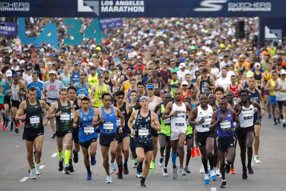 Elite runners at the start of the 2019 L.A. Marathon. Many training programs start in August for the annual race.
