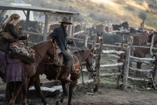 Abbey Lee as Marigold and Kevin Costner as Hayes Ellison in "Horizon: An American Saga - Chapter One."