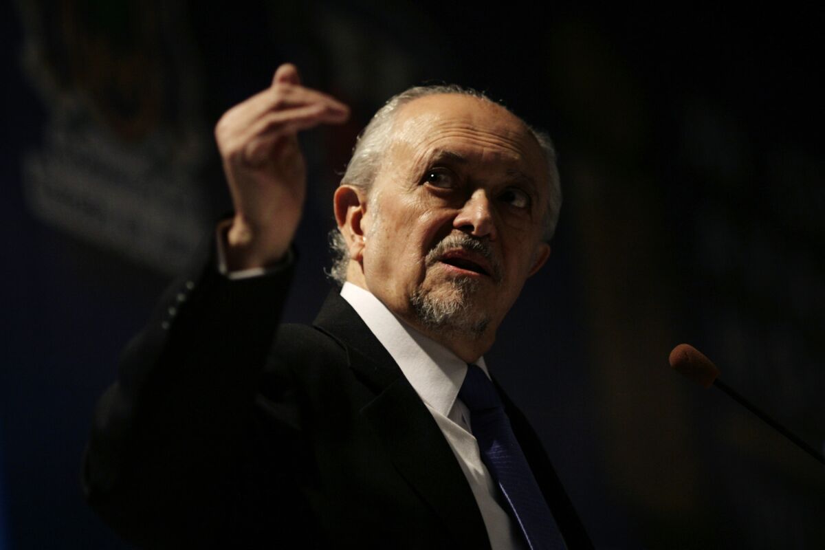 FILE - In this Feb 25. 2010 file photo, Mexico's Nobel Chemistry Prize laureate Mario Molina gestures during a conference on global warming in Guadalajara, Mexico. Molina has died on Wednesday, October 7, 2020, his family informed. (AP Photo/Carlos Jasso, File)