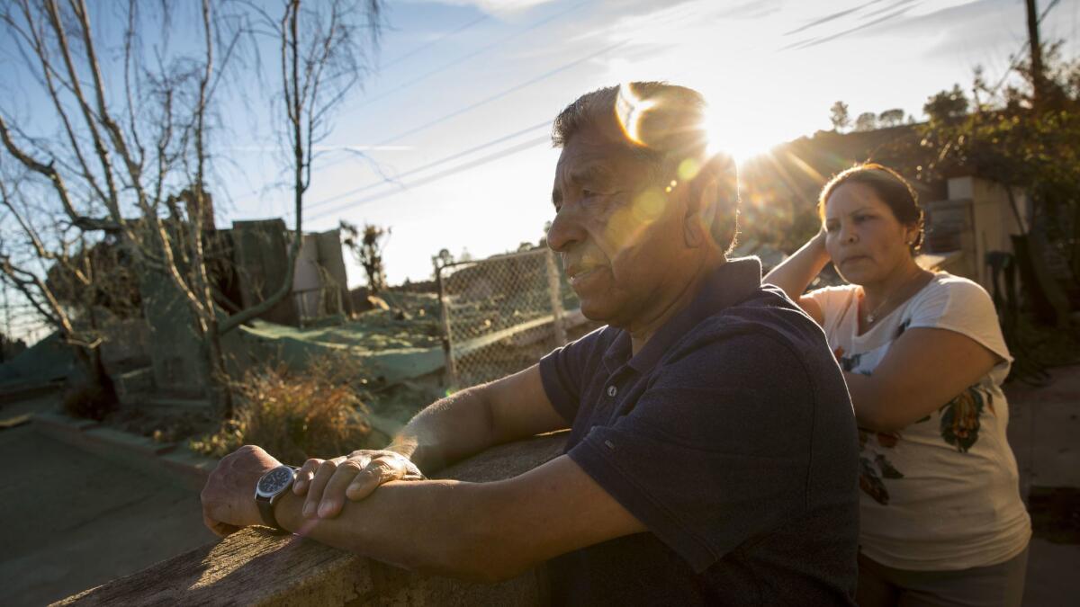 Raul Gamino and his wife Yolanda, at their east Ventura home that survived the Thomas Fire.