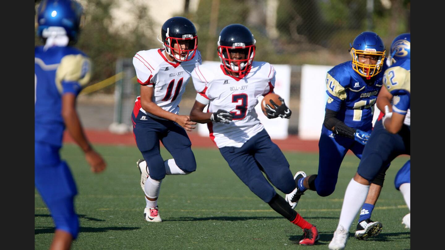 Bell-Jeff High School football player #3 Canaan Williams looks for room to run in away game vs. Calvary Baptist High School, at Damien High School's football field in La Verne on Saturday, Sept. 9, 2017.