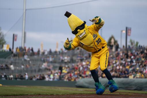 KANSAS CITY, KS - MAY 06: Split, the mascot of the Savannah Bananas dances before the start of a banana ball game.