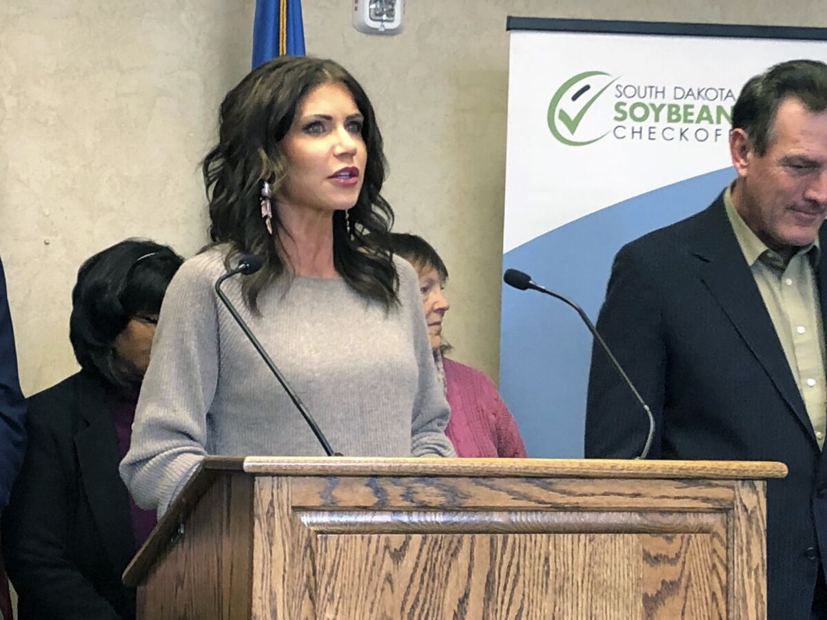 South Dakota Gov. Kristi Noem speaks at a news conference in Sioux Falls, Idaho on Monday, Nov. 1, 2021 . Noem insisted that a meeting she held last year didn’t include any discussion of a path forward for her daughter after a state agency moved to deny her a real estate appraiser license. (AP Photo/Stephen Groves)