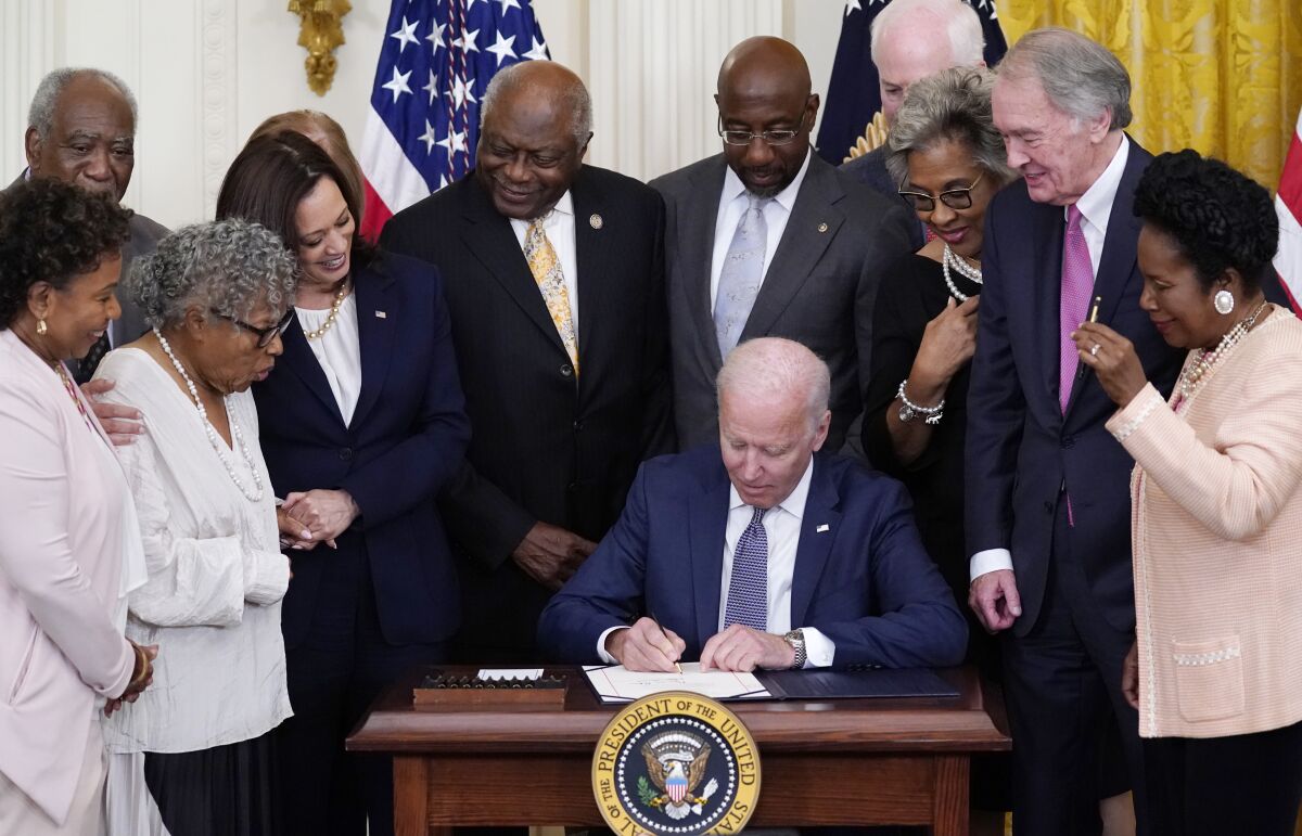 President Joe Biden signs the Juneteenth National Independence Day Act