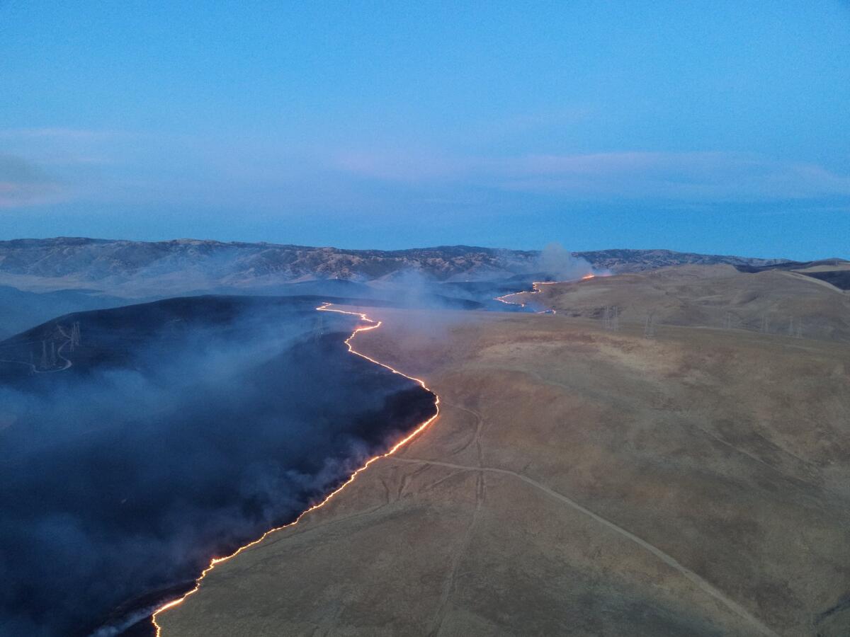 The Corral Fire, southwest of Tracy, has reached 14,000 acres and was 30% contained as of Sunday morning.