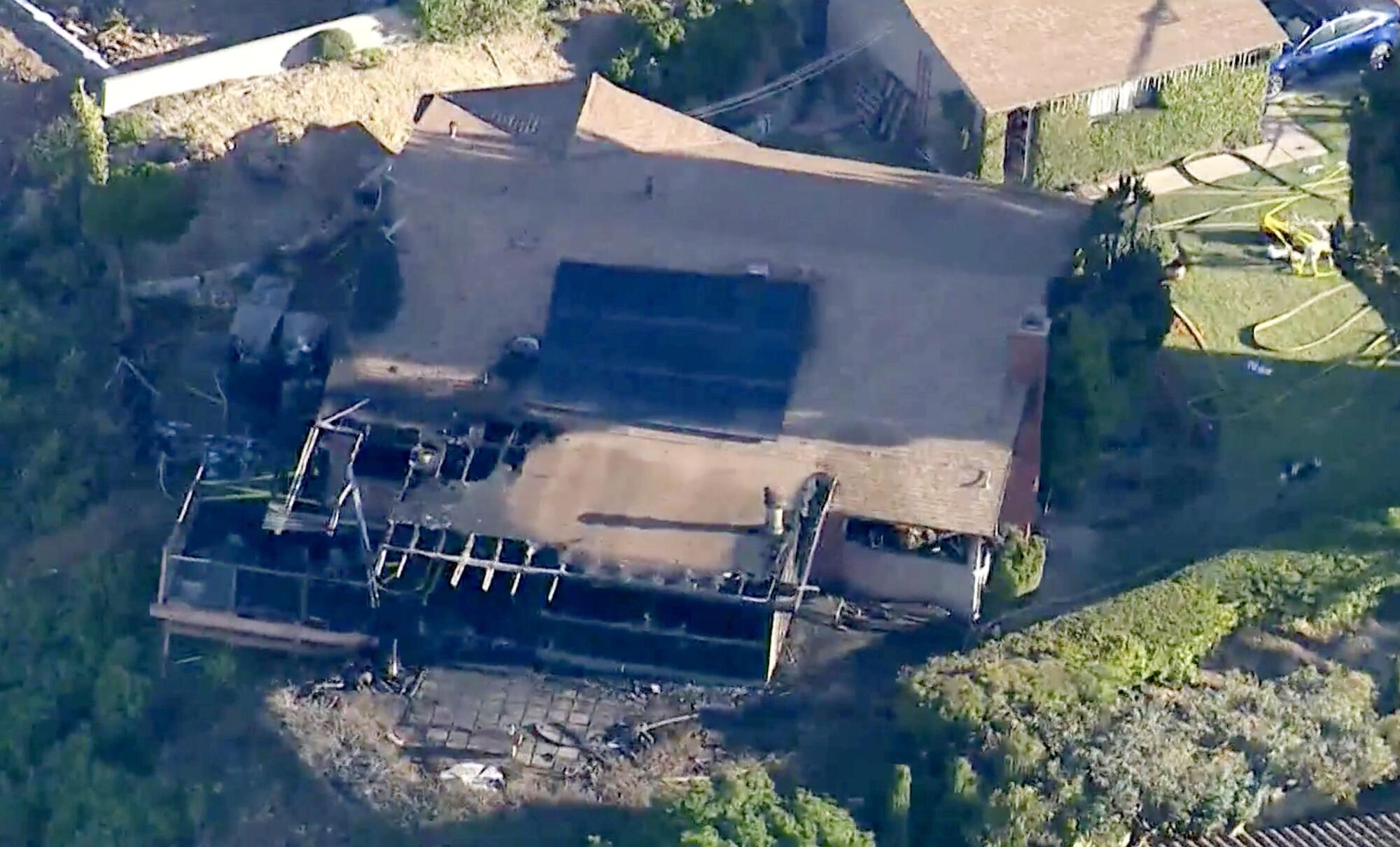 Aerial view of the burned home in the 30700 block of Tarapaca Road in Rancho Palos Verdes.