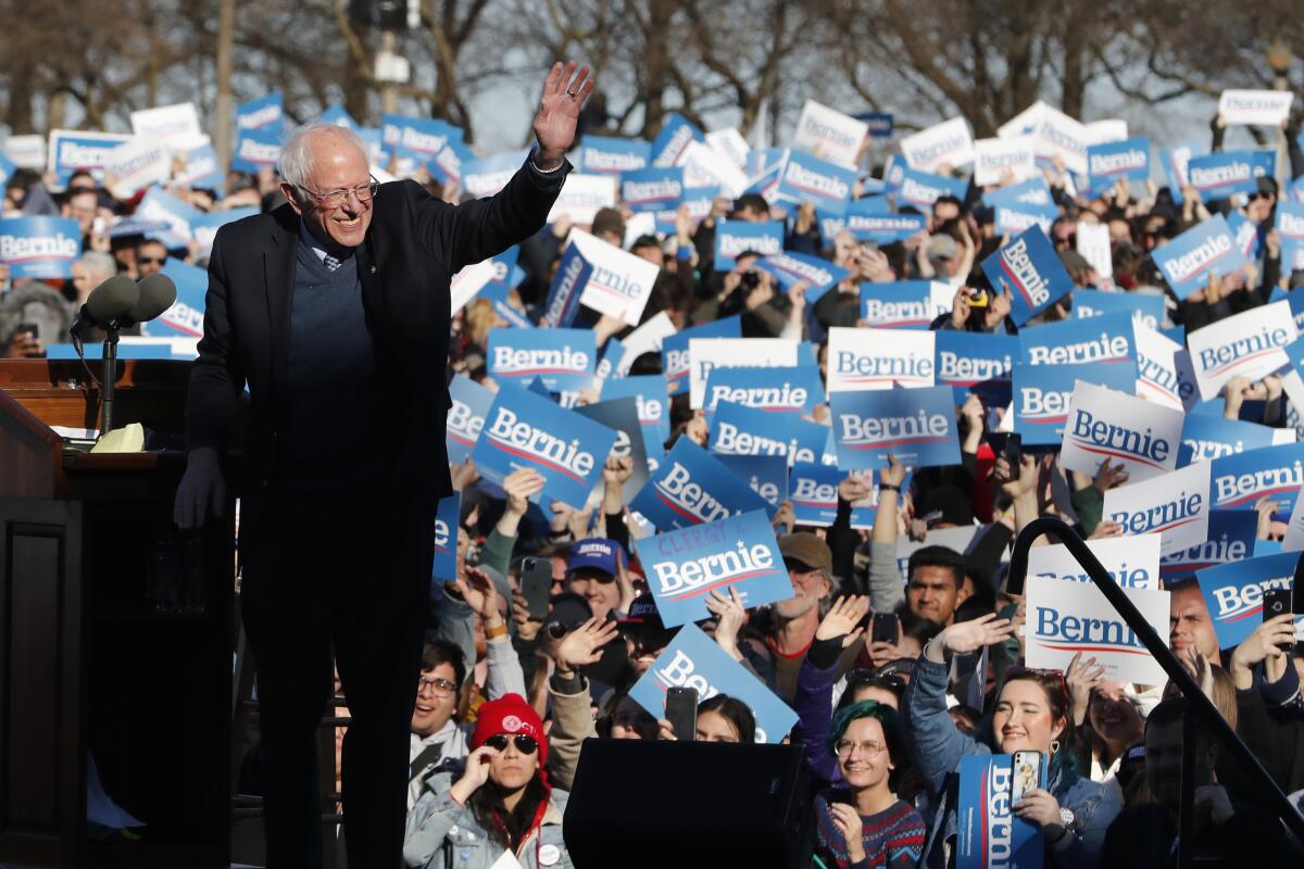 Democratic presidential candidate Sen. Bernie Sanders waves to supporters after speaking at a campaign rally in Chicago's Grant Park on March 7.