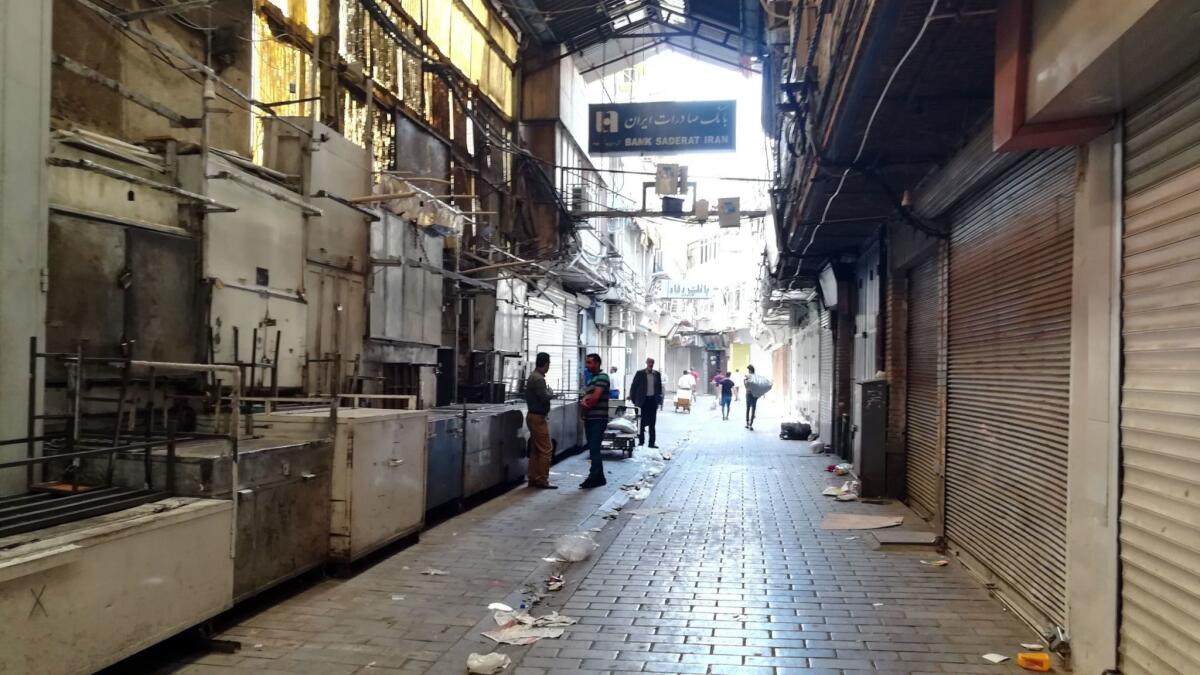 Shops in Tehran's Grand Bazaar are closed as traders protest rising prices and the weakening of Iran's currency.