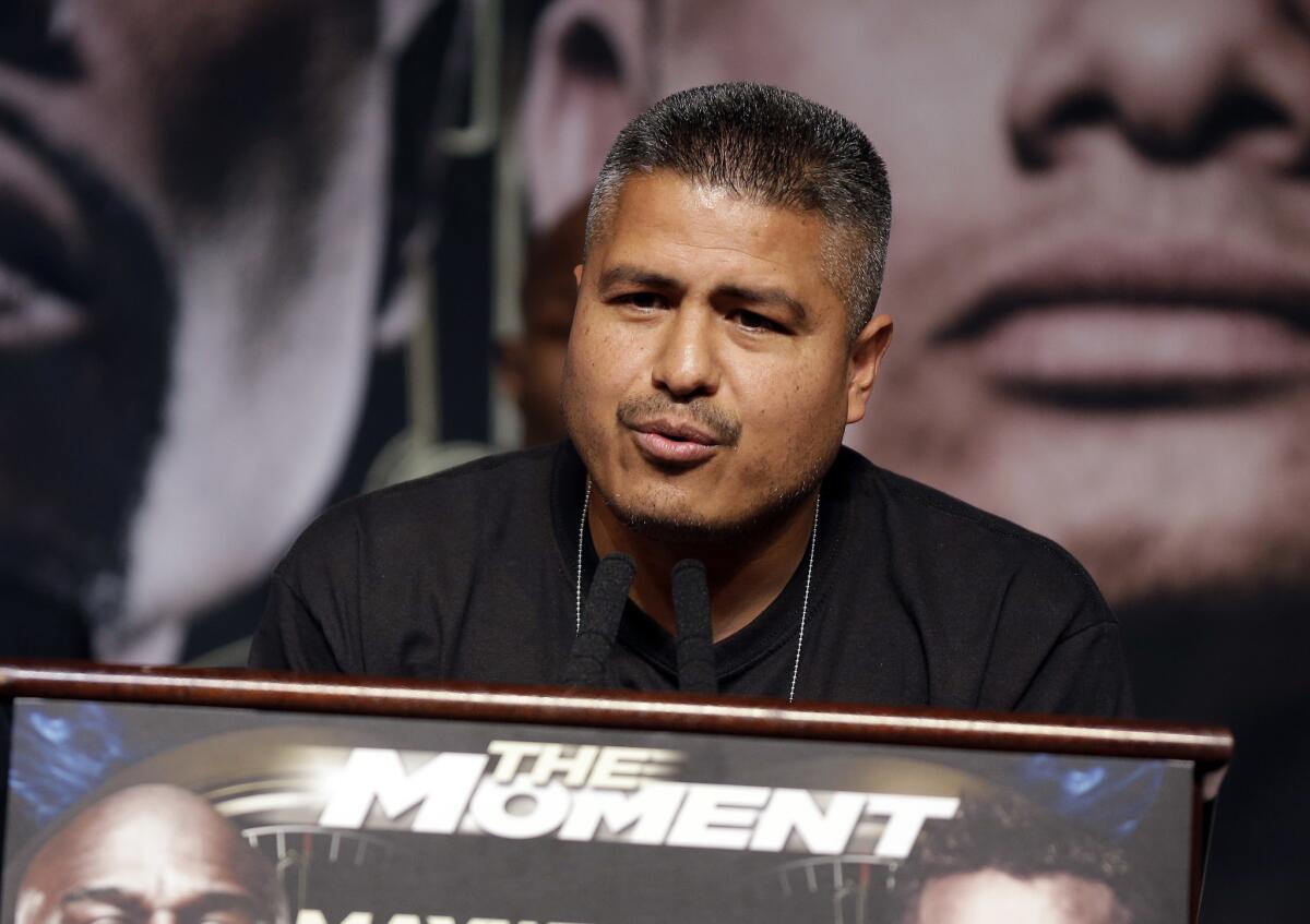 Trainer Robert Garcia speaks during a news conference on Wednesday, April 30, 2014, in Las Vegas. Marcos Maidana is to square off with Floyd Mayweather Jr. in a welterweight title fight on Saturday, May 3.