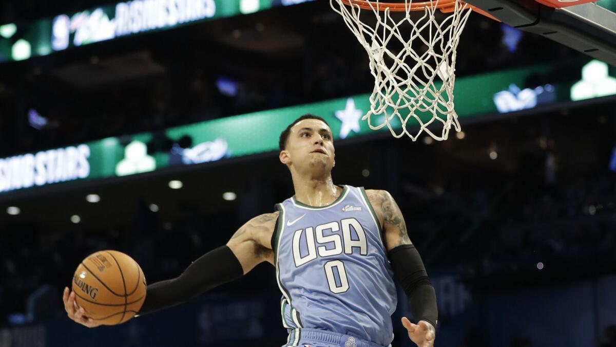 Kyle Kuzma of the Lakers dunks during the Rising Stars game on Friday night, in which he scored 35 points.