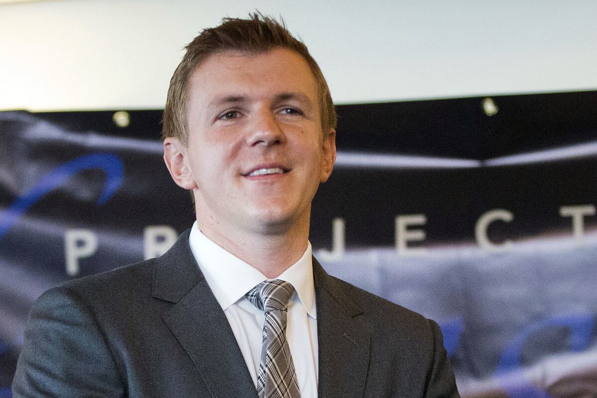 FILE - In this Sept. 1, 2015, file photo, James O'Keefe, President of Project Veritas Action, waits to be introduced during a news conference at the National Press Club in Washington. A former federal judge was appointed Wednesday, Dec. 8, 2021, to ensure no First Amendment protections or attorney-client privileges are violated in the review of materials seized by U.S. law enforcement authorities from individuals connected with the conservative group Project Veritas. O'Keefe, the founder of the group that calls itself a news organization, said previously that agents had searched his home, and the homes of two others, in connection with a diary purported to belong to President Joe Biden’s daughter. (AP Photo/Pablo Martinez Monsivais, File)