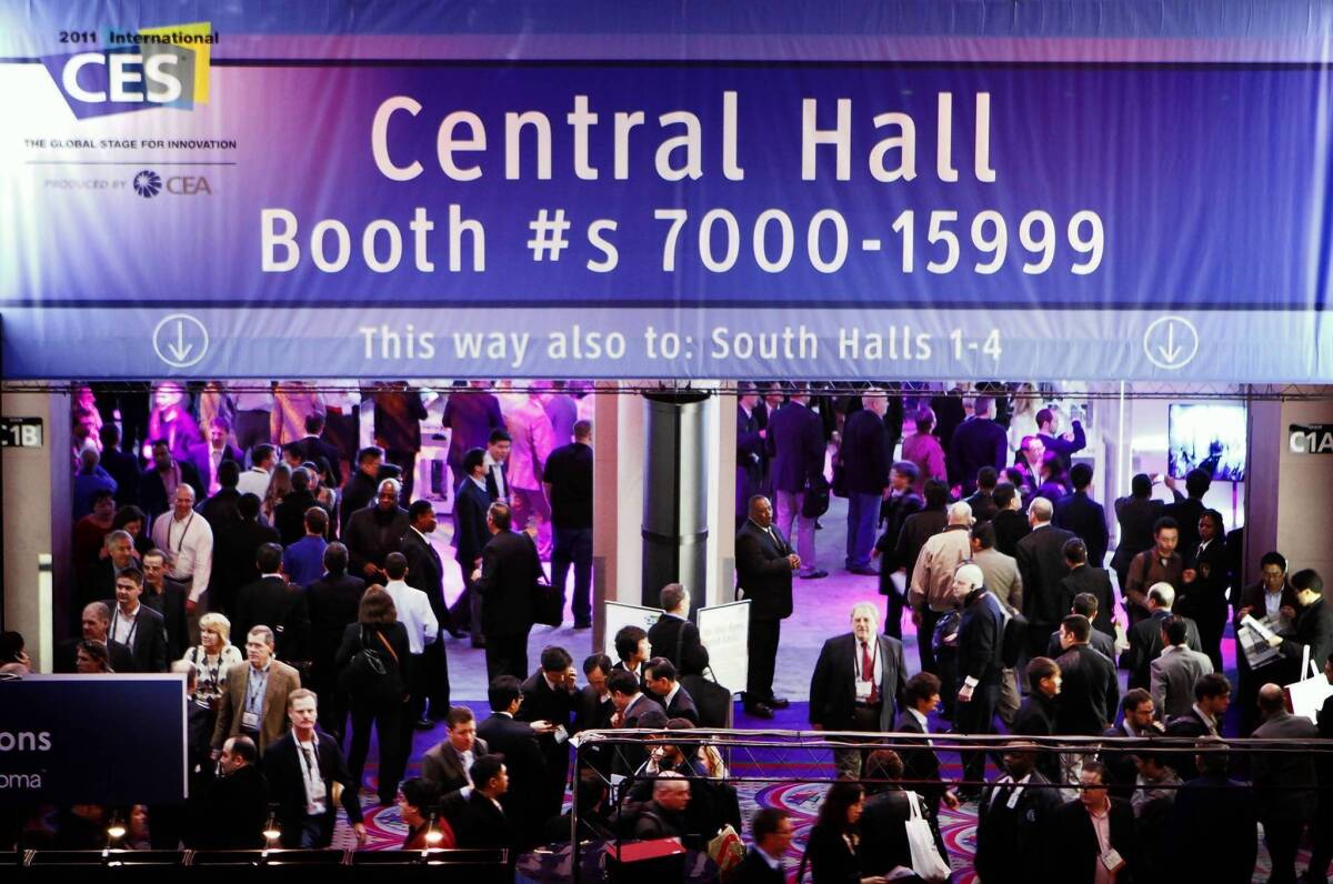 Crowds pack the Las Vegas Convention Center at the 2011 International Consumer Electronics Show. Over the years, the focus has changed from groundbreaking technology to networking.