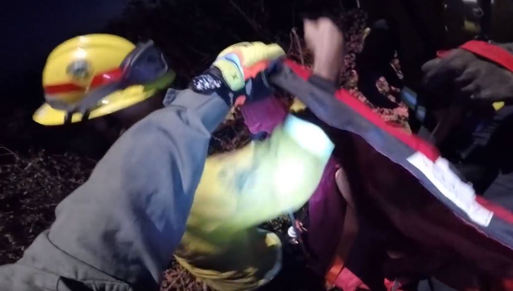 Video captures helicopter rescue of firefighters trapped as flames approach