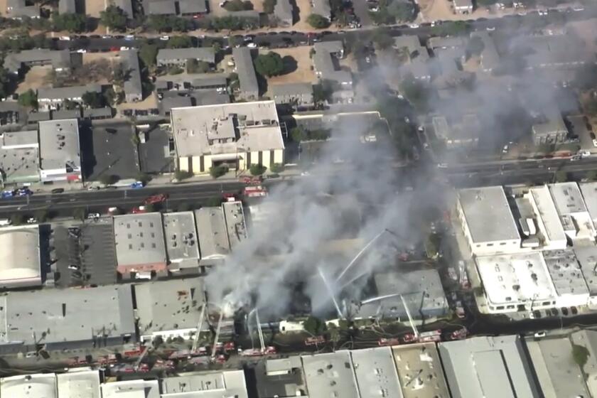 Fire crews in Los Angeles battled a raging fire that burned through several commercial buildings in Boyle Heights Monday afternoon. The fire was first reported around 2 p.m. in the 2800 block of East 11th Street.