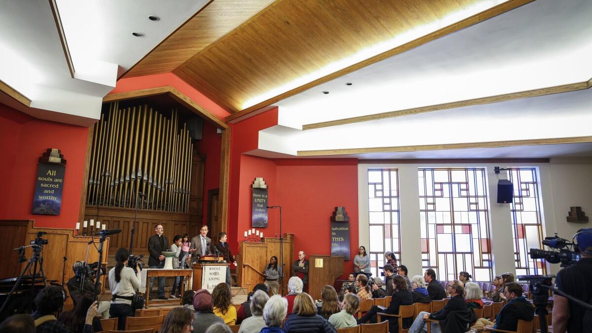 Hans Meyer, the lawyer for Jeanette Vizguerra, addresses supporters and the news media as Vizguerra seeks sanctuary at First Unitarian Society in Denver on Feb. 15.