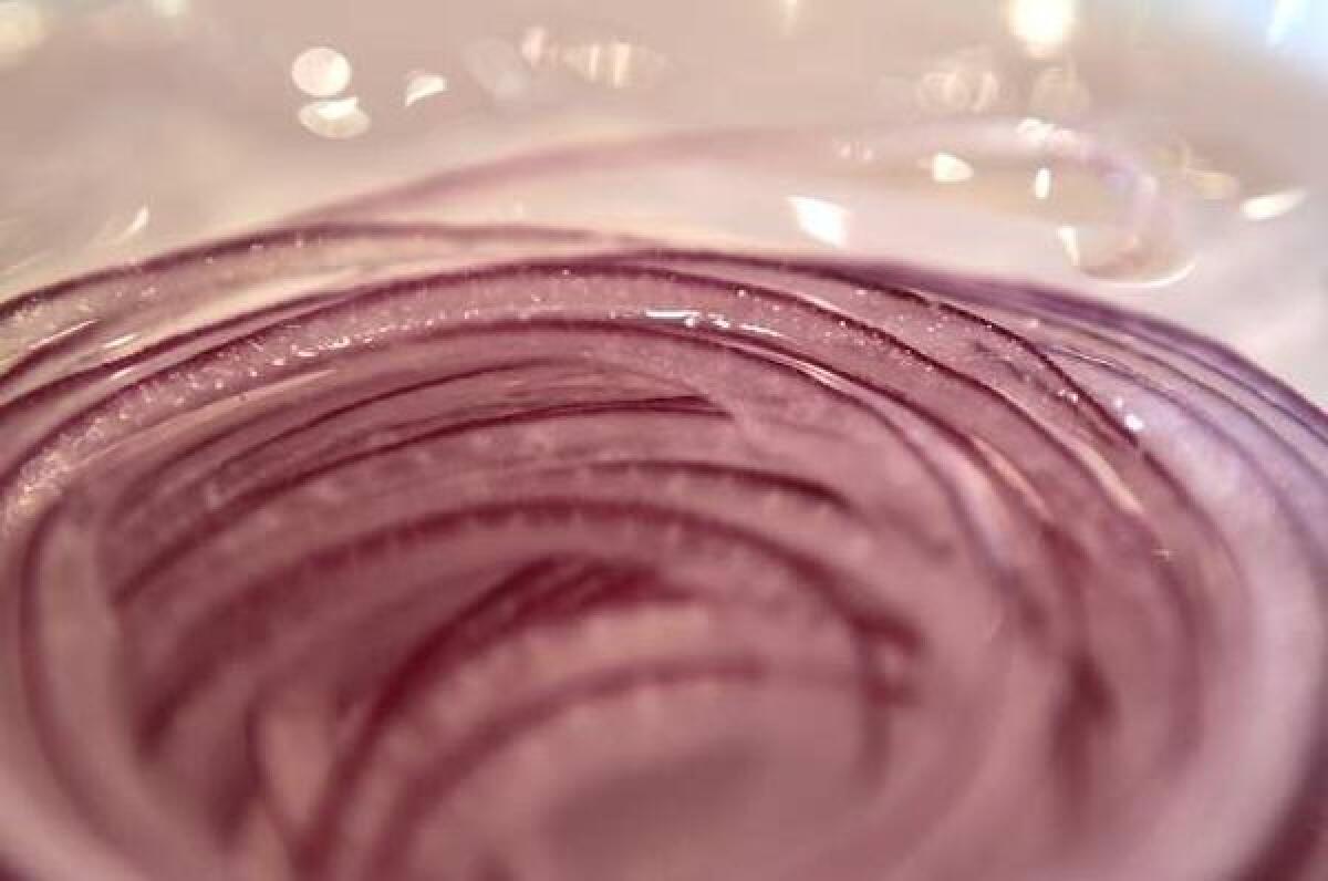 Soak onions in water to soften flavor.