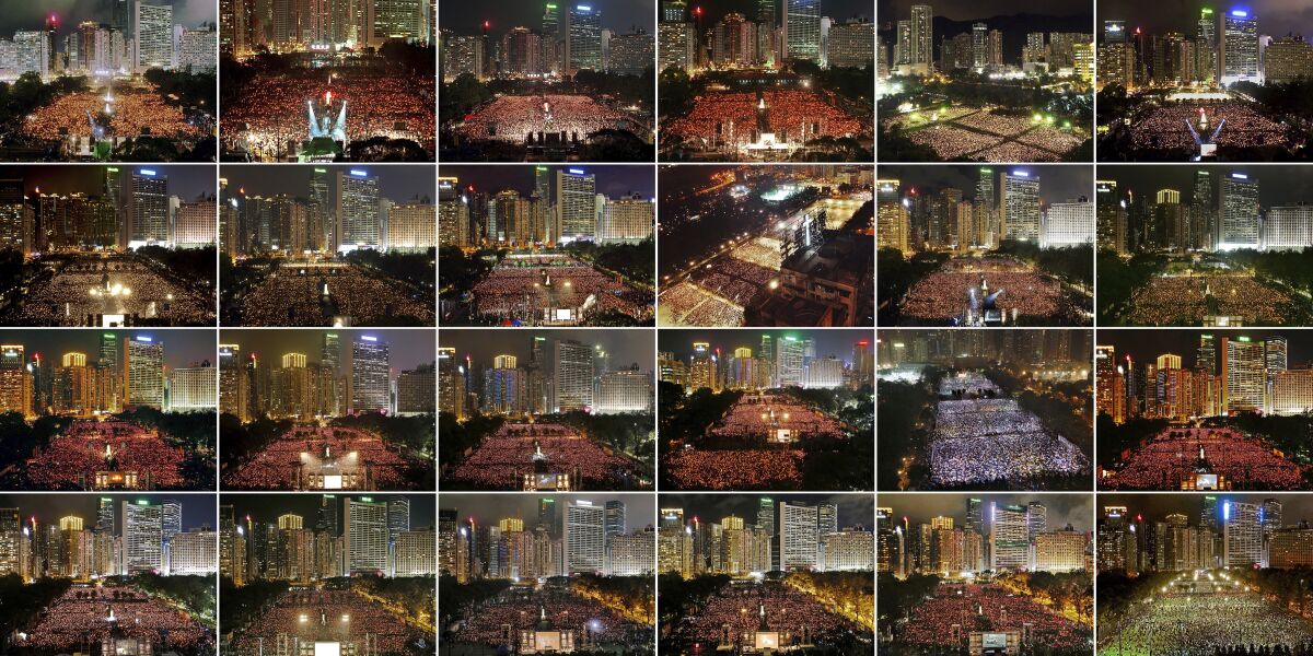 This combination of images taken between 1997 and 2020 shows the thousands of people who attended the June 4th candlelight vigil in Hong Kong's Victoria Park to mark the anniversary of the 1989 military crackdown on a pro-democracy student movement in Beijing. Hong Kong has been one of just two cities in China allowed to mark the bloody crackdown on pro-democracy protesters in Beijing’s Tiananmen Square in 1989. Top row from left; 1997, 1998, 1999, 2000, 2001 and 2002. Second row from left; 2003, 2004, 2005, 2006, 2007 and 2008. Third row from left; 2009, 2010, 2011, 2012, 2013 and 2014. Bottom row from left; 2015, 2016, 2017, 2018, 2019 and 2020. (AP Photo/Vincent Yu)