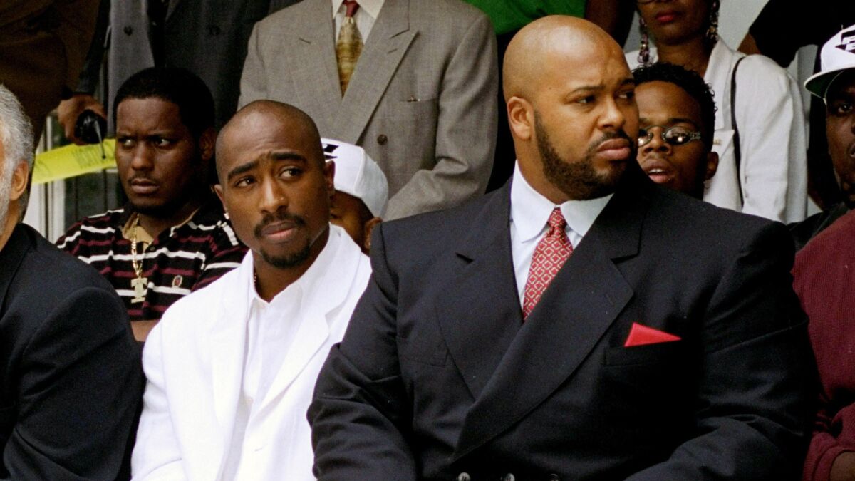 Marion "Suge" Knight, right, and Tupac Shakur at a 1996 voter registration event in South Los Angeles.