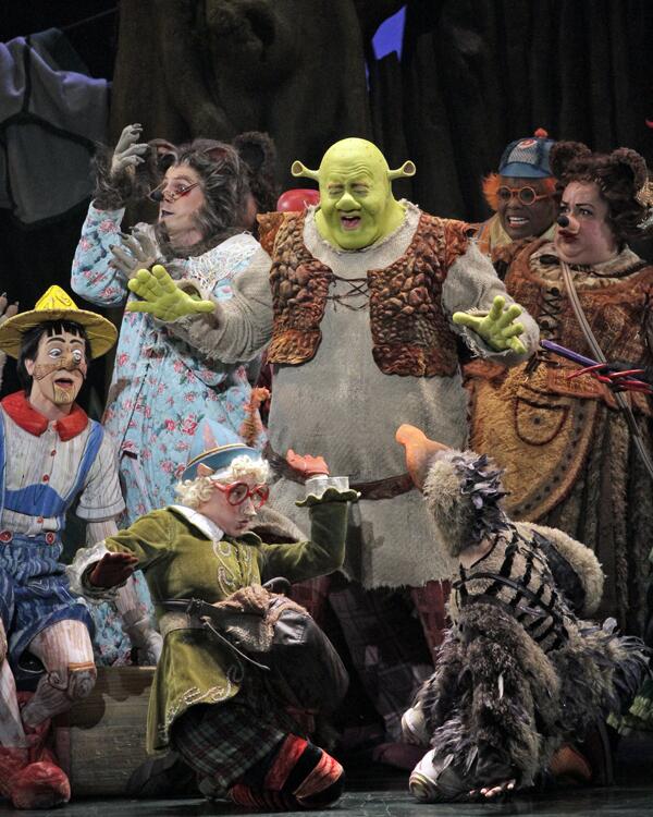 Eric Petersen stars as Shrek the ogre with the ensemble. "Shrek: The Musical," based on the Oscar-winning DreamWorks film from 2001, opened at the Pantages Theatre on Tuesday.