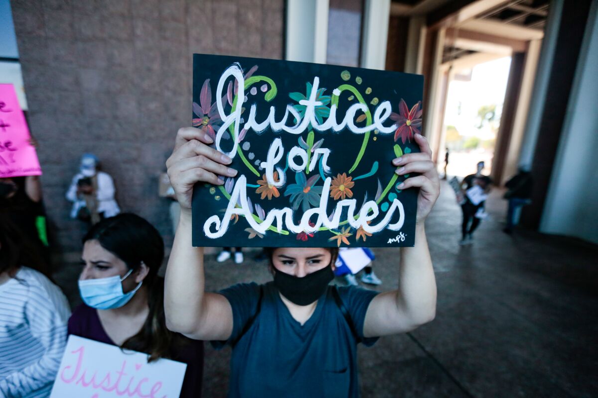 Demonstrators rally outside the L.A. County sheriff's station in Compton to protest the shooting death of Andres Guardado.