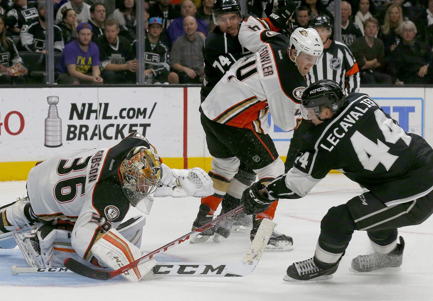 Ducks goalie John Gibson makes a save against Kings center Vincent Lecavalier during the third period.