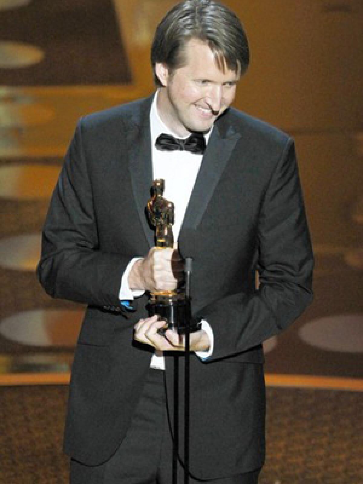 Tom Hooper accepts the Oscar for best achievement in directing for "The King's Speech."