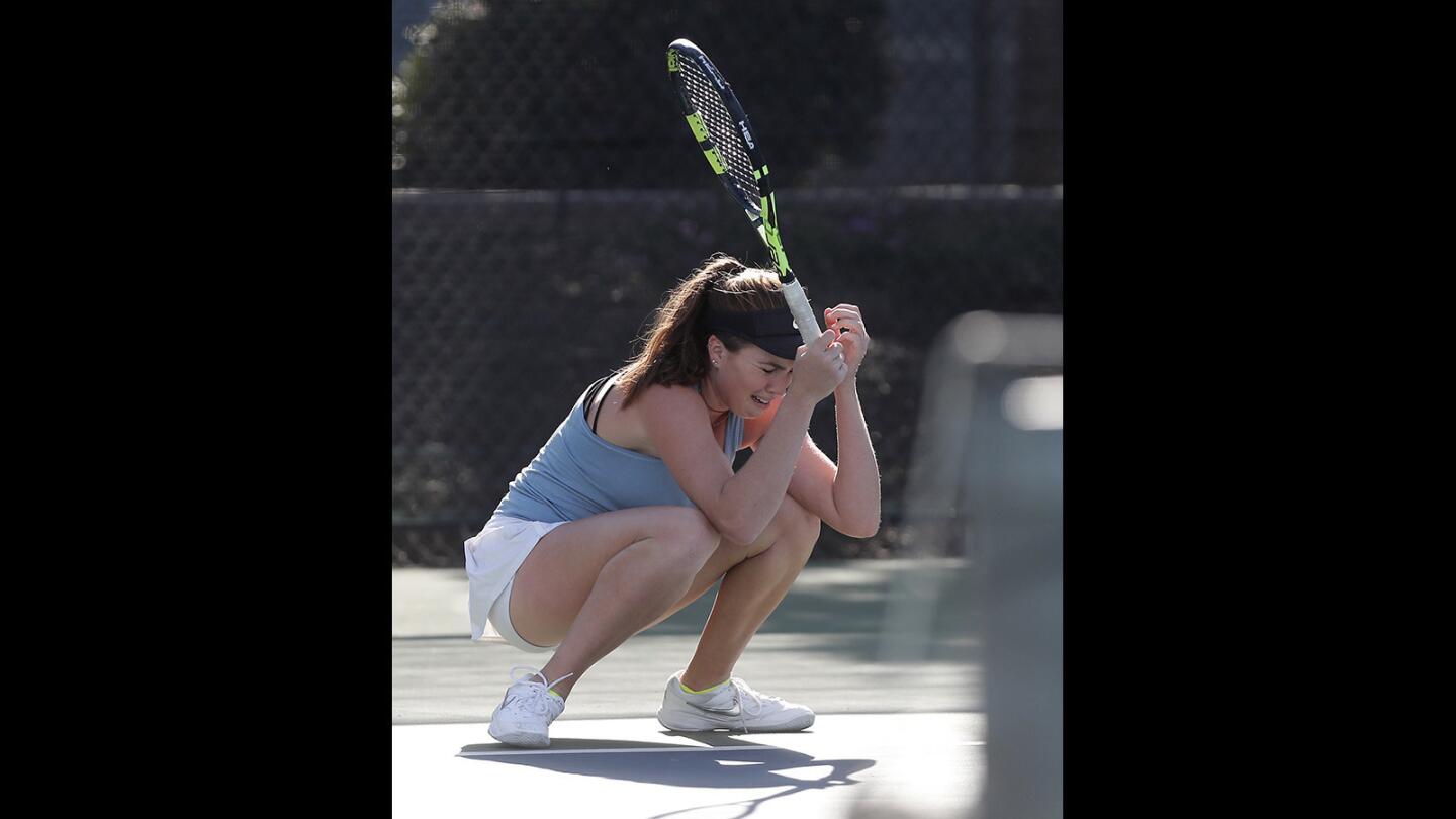 Corona del Mar High doubles player Roxy MacKenzie reacts after an error during the second set against Los Angeles Marlborough in the CIF Southern Section Individuals doubles semifinals at Seal Beach Tennis Center on Friday, November 30, 2018.