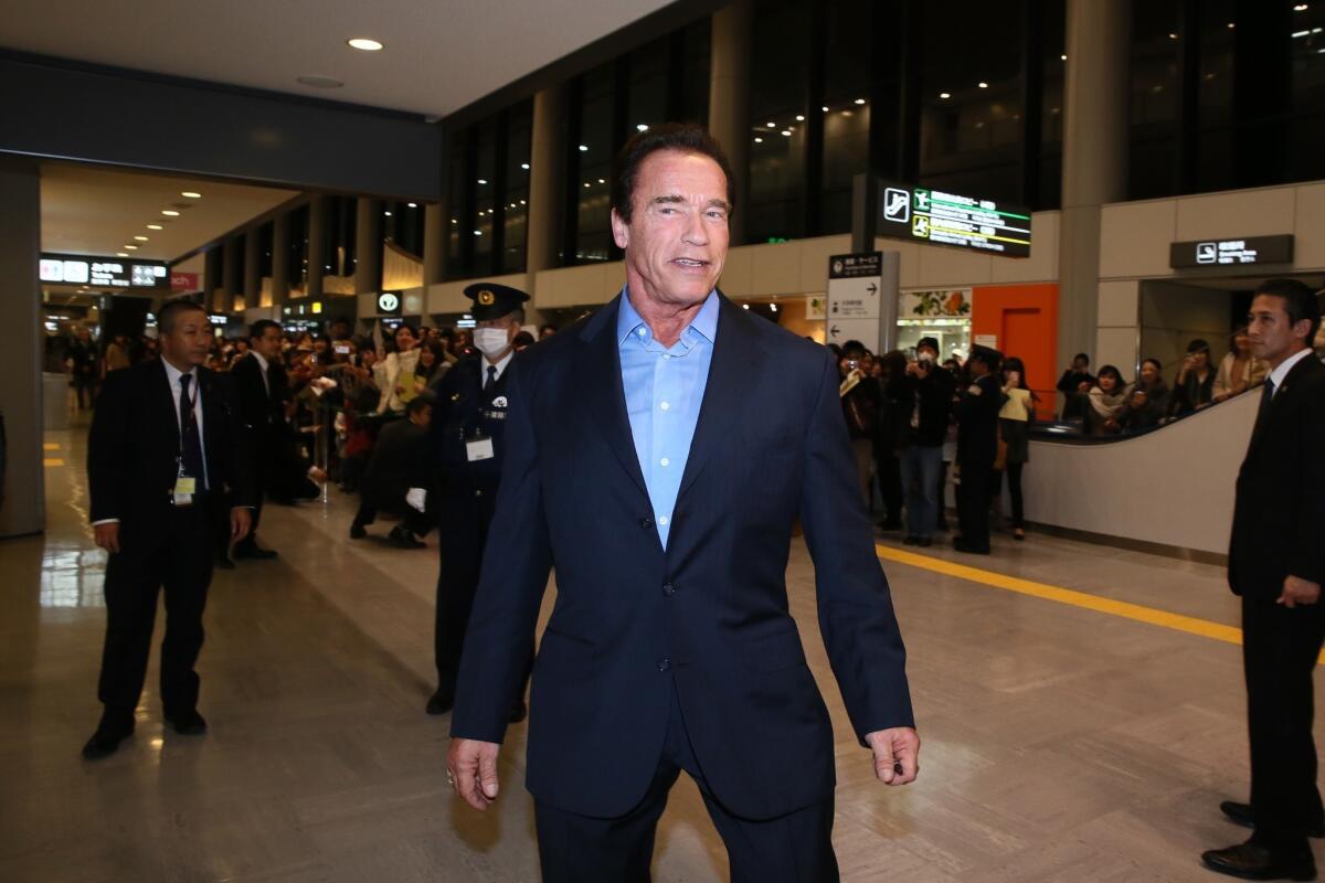 Arnold Schwarzenegger is involved in a documentary about climate change that is to air April 13 on Showtime. Here, he is seen arriving at Narita International Airport last month in Narita, Japan.