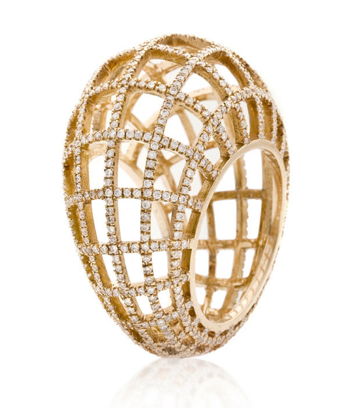 Nada G 18-karat gold Matrix ring with diamonds.