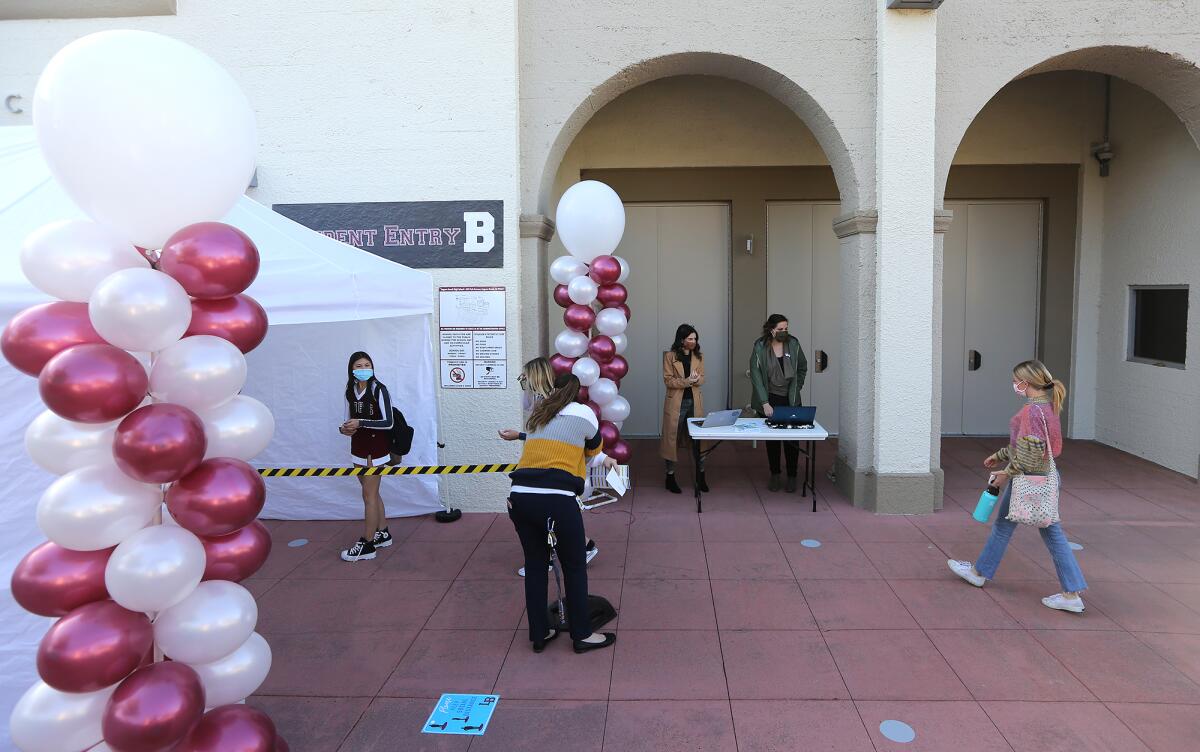 Students arrive for in-person instruction at Laguna Beach High School on March 17.
