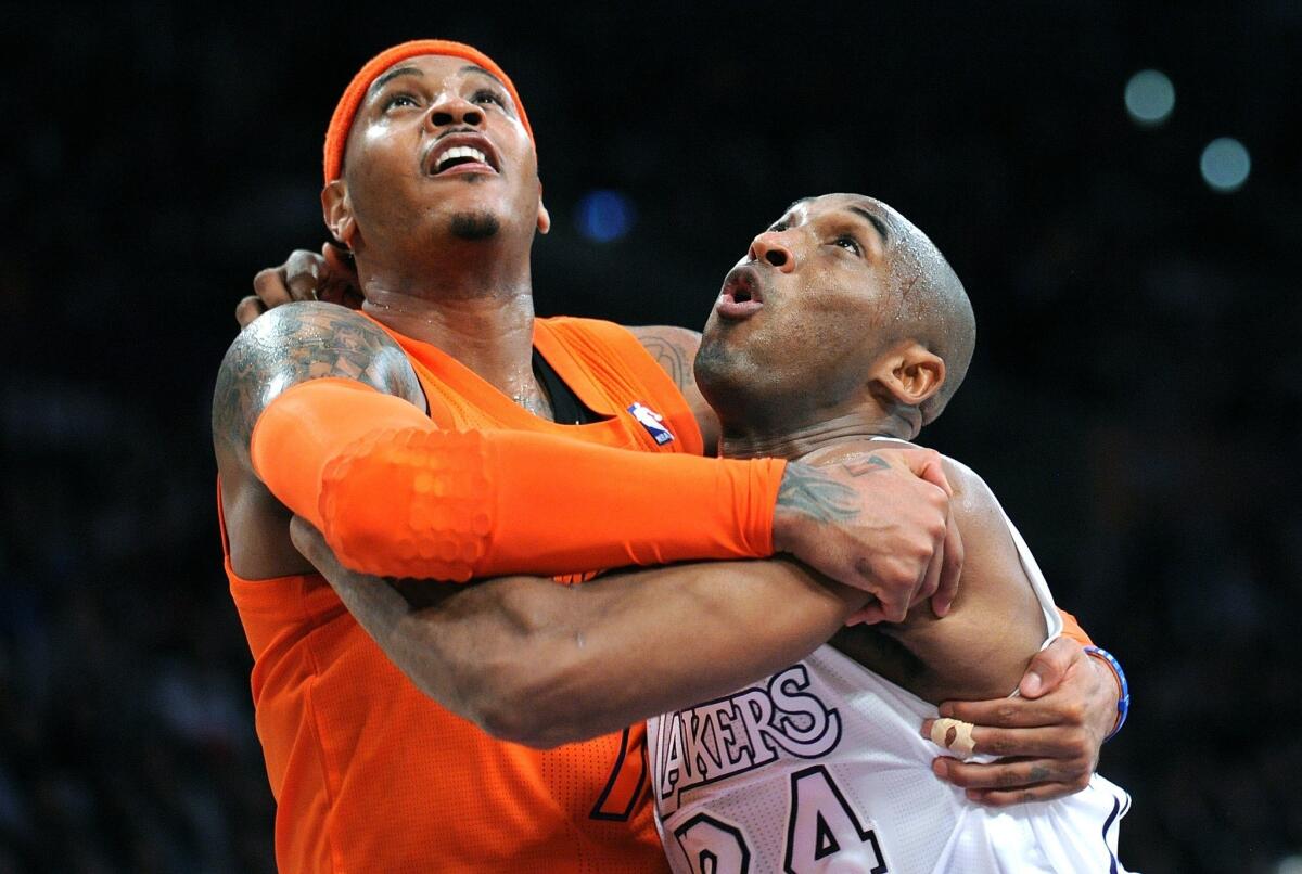 Could NBA foes Carmelo Anthony, left, and Kobe Bryant be coming together as Lakers teammates in the near future?