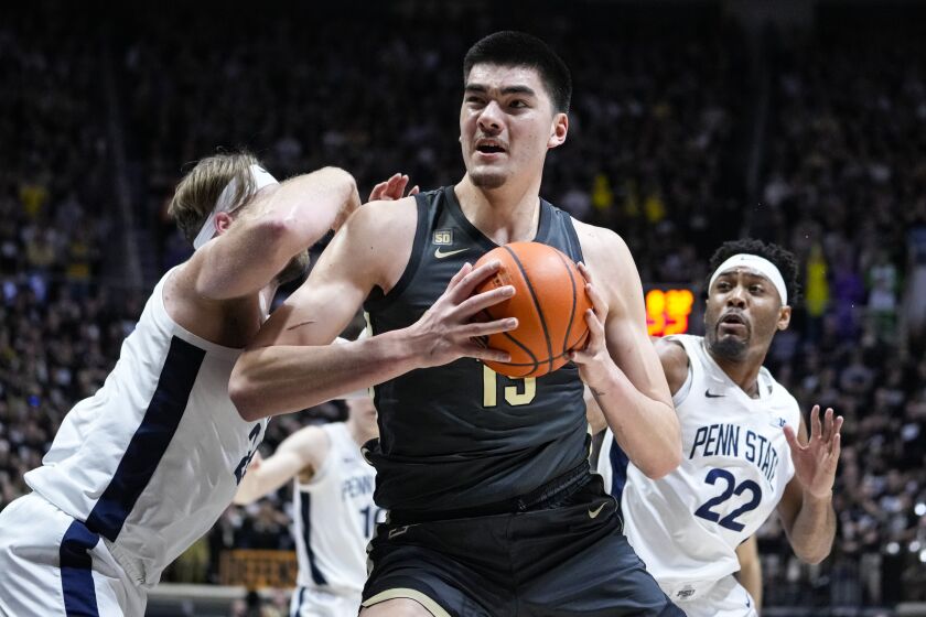 Purdue center Zach Edey (15) goes up for a shot around Penn State forward Michael Henn (24) during the second half of an NCAA college basketball game in West Lafayette, Ind., Wednesday, Feb. 1, 2023. Purdue defeated Penn State 80-60. (AP Photo/Michael Conroy)