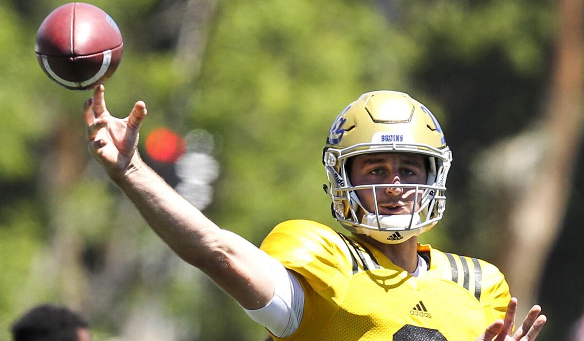UCLA quarterback Josh Rosen makes a pass during the UCLA Spring showcase on Saturday at Drake Stadium, on the UCLA campus.