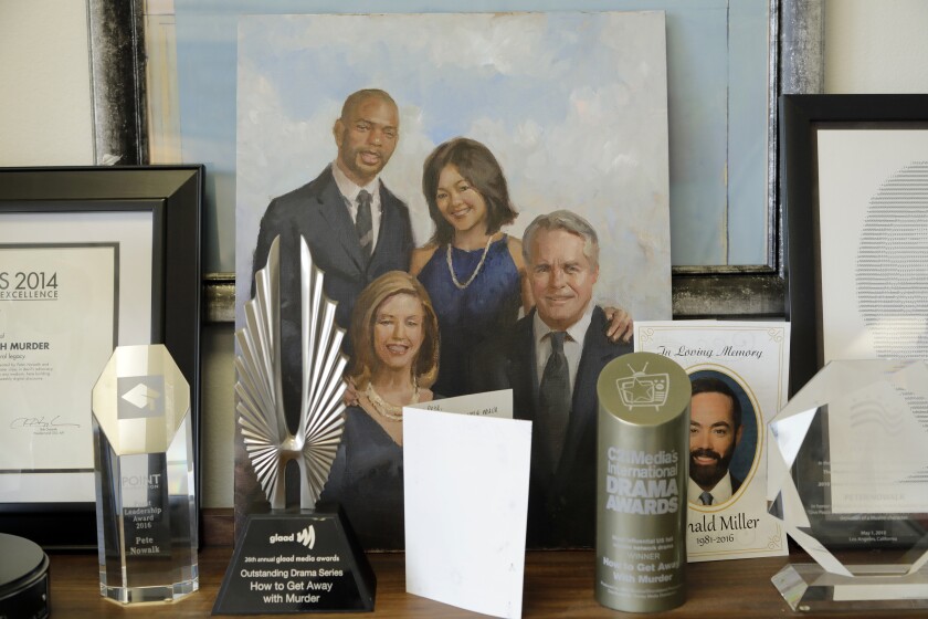 Pete Nowalk is the creator and showrunner of ABC's "How to Get Away With Murder." Awards and a portrait from Season 2 are displayed on his bookshelf.