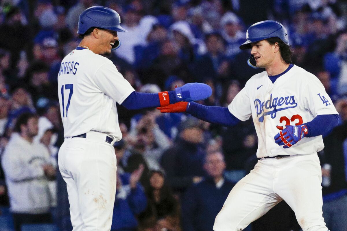 Dodgers' James Outman, right, celebrates with Miguel Vargas after hitting a home run Thursday against Arizona.