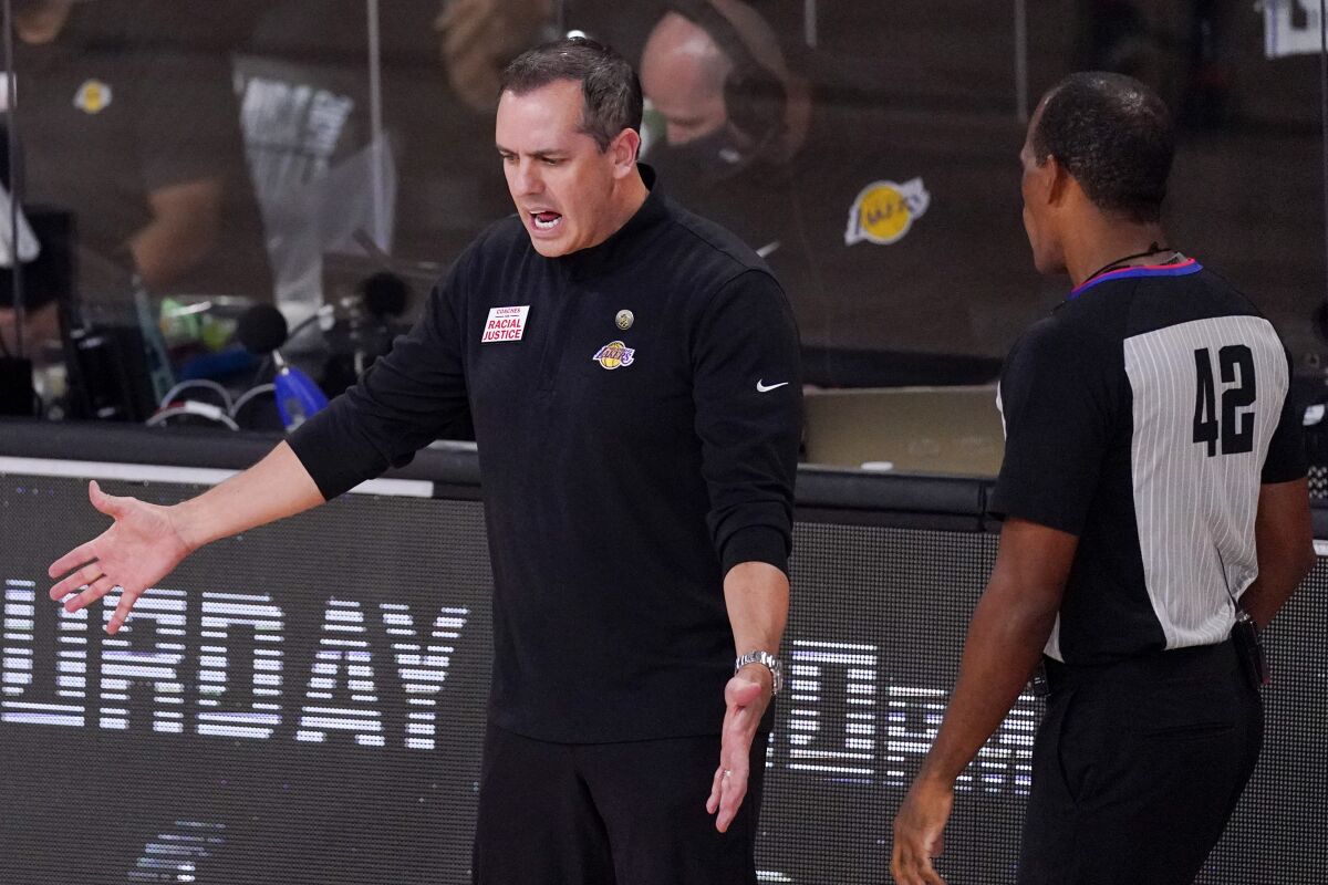Los Angeles Lakers head coach Frank Vogel argues a call with referee Eric Lewis  during Game 5.
