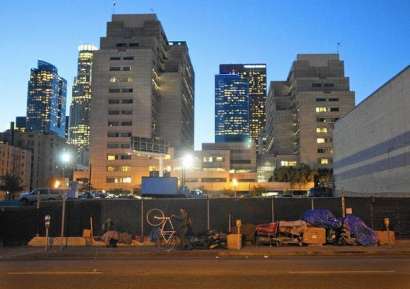 Activists who banged drums and shouted during a 2011 walk through Los Angeles' skid row led by city officials and business leaders were protected under a state law that applies to political gatherings, a federal appeals court panel ruled.