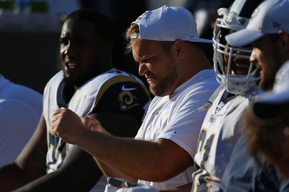 Rams offensive lineman Brian Allen sits on the bench during a preseason game against the Oakland Raiders on Aug. 10.