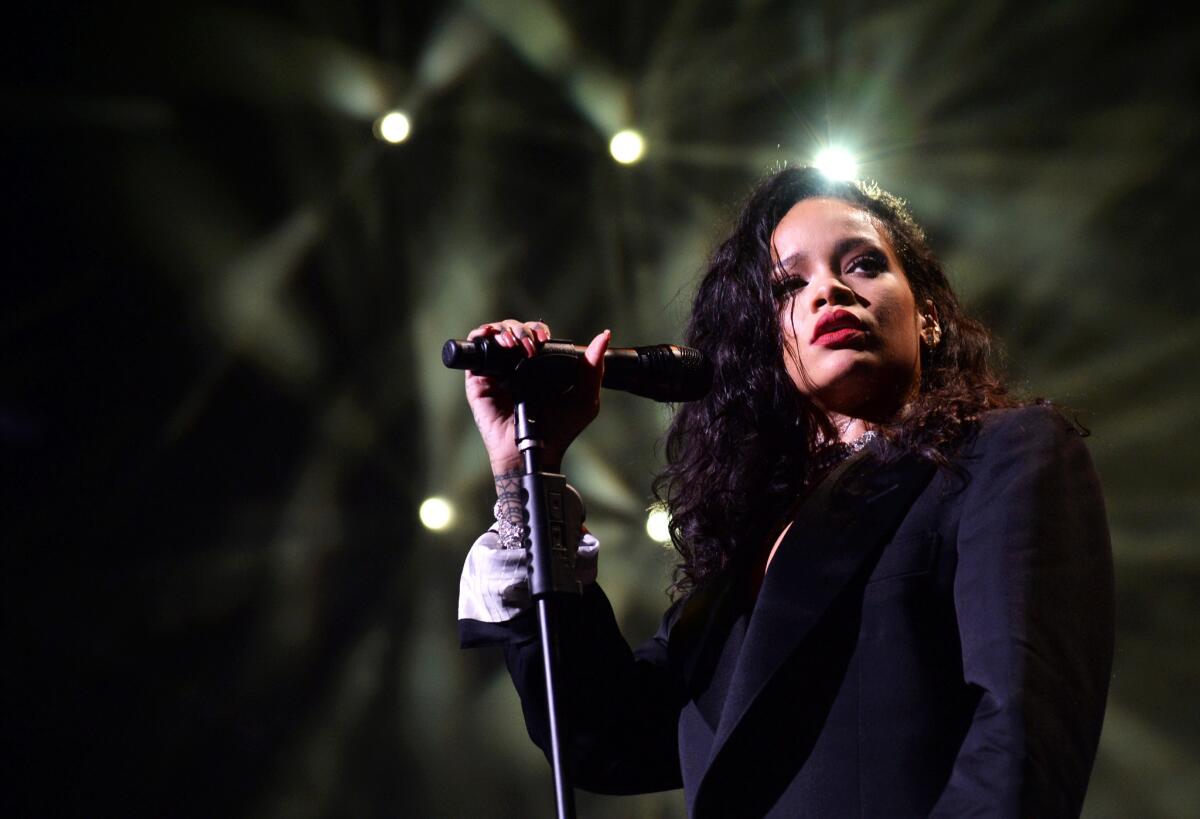 Rihanna performs onstage during DirecTV Super Saturday Night at Pendergast Family Farm on Jan. 31, 2015 in Glendale, Ariz.