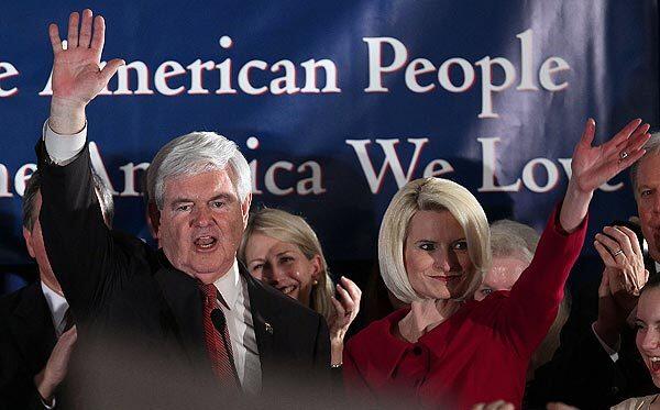 Former House speaker Newt Gingrich and his wife, Callista, wave during a rally in Columbia, S.C., after he was declared the winner of the state's Republican presidential primary. A different candidate has emerged victorious in each of the first three contests for the Republican nomination.