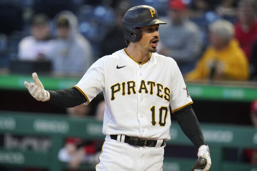 FILE - Pittsburgh Pirates' Bryan Reynolds disagrees with a called third strike during the first inning of a baseball game against the Cincinnati Reds in Pittsburgh, on Sept. 27, 2022. Reynolds has requested a trade ahead of baseball's winter meetings. (AP Photo/Gene J. Puskar, File)