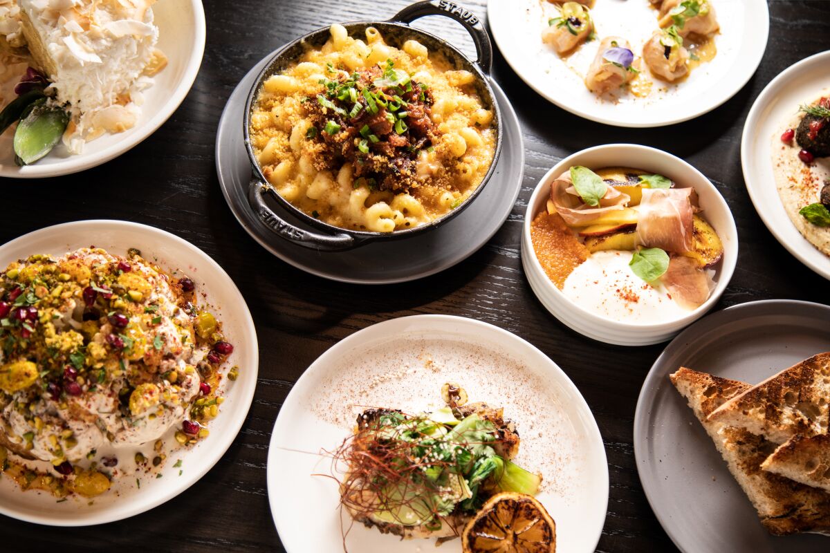 The Fuego menu highlights the greatest hits from Michael Mina and Ayesha Curry's new global barbecue restaurant International Smoke.